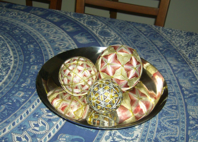 Thread wrapped balls in a West Elm bowl. Photo by Holly Tierney-Bedord. All rights reserved.