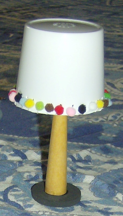 Lamp made from a Keurig coffee serving. Photo by Holly Tierney-Bedord. All rights reserved.