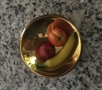 A mid-century knob becomes a mini bowl of fruit. Photo by Holly Tierney-Bedord. All rights reserved.