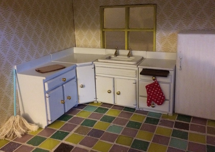 White cupboards in my mini kitchen. Photos by Holly Tierney-Bedord. All rights reserved.