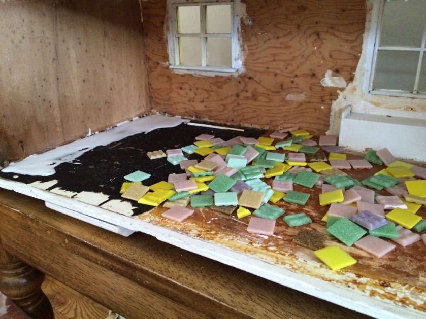 Installing kitchen tiles in my dollhouse. Photo by Holly Tierney-Bedord. All rights reserved.