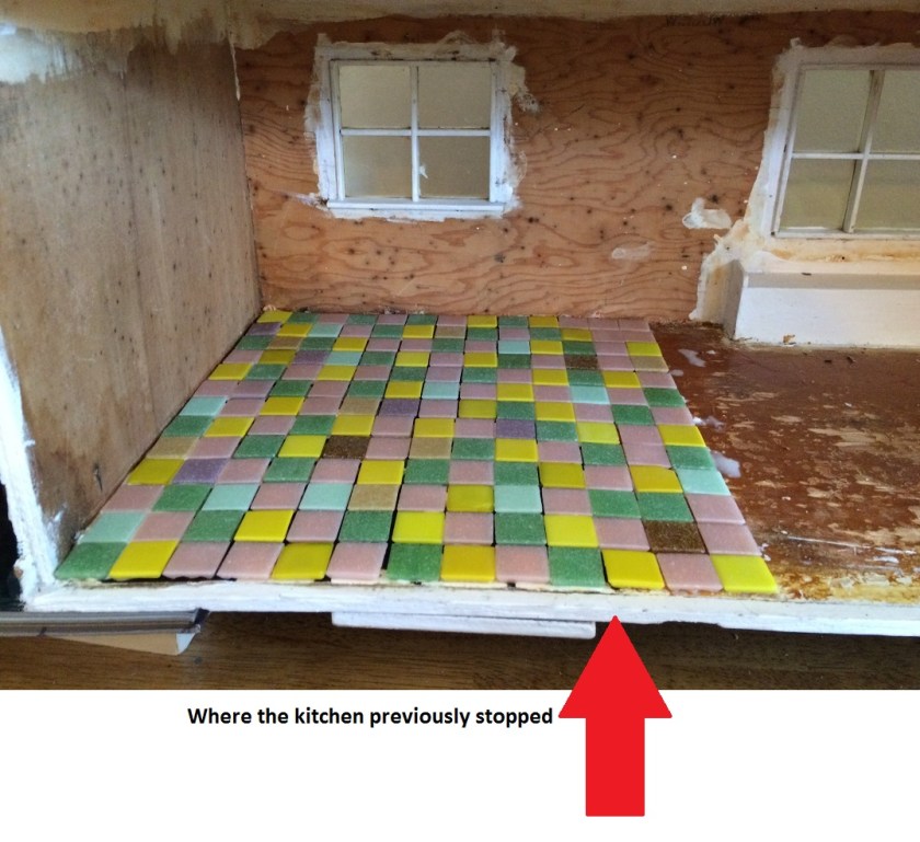 Installing kitchen tiles in my dollhouse. Photo by Holly Tierney-Bedord. All rights reserved.
