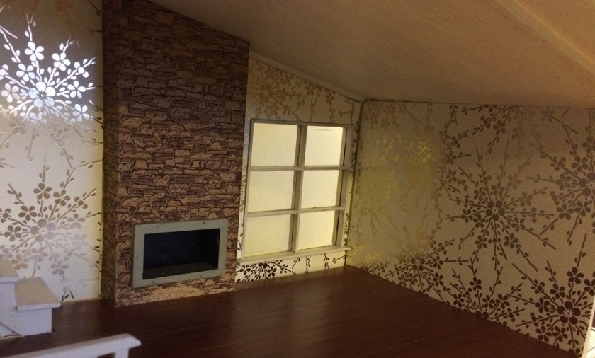 Installing wallpaper. Photo by Holly Tierney-Bedord. All rights reserved.