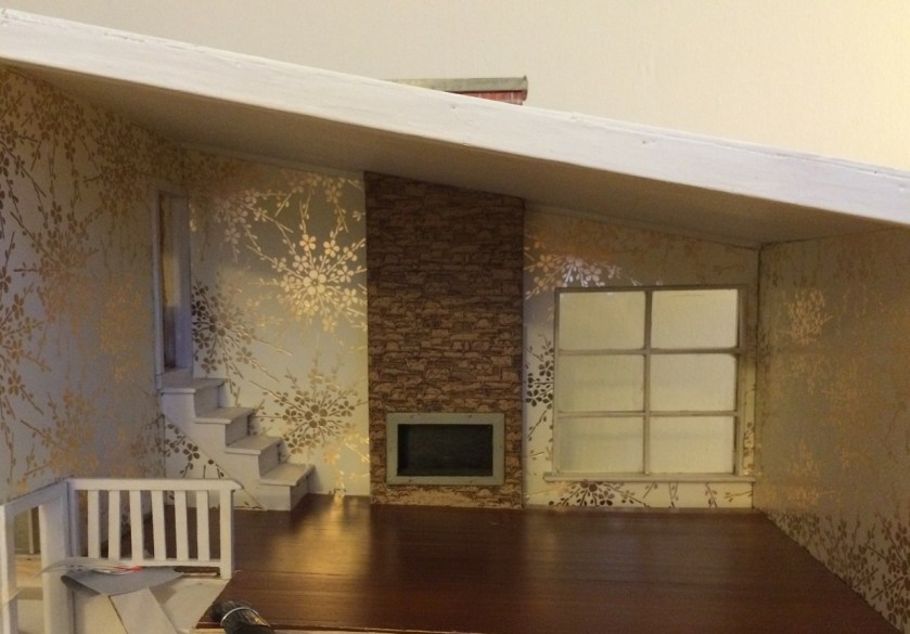 Installing wallpaper. Photo by Holly Tierney-Bedord. All rights reserved.