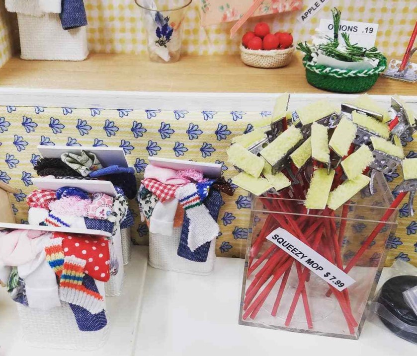 Overflowing laundry hampers and tiny mops.